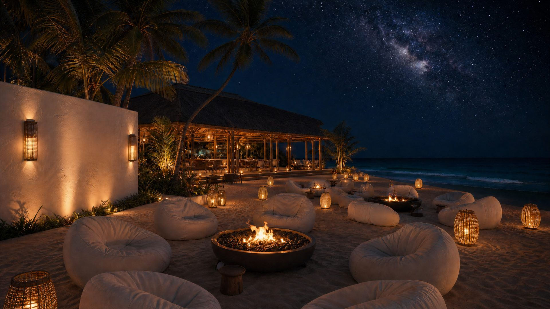 Guests gathering around a fire at The Secret Beach Club at night